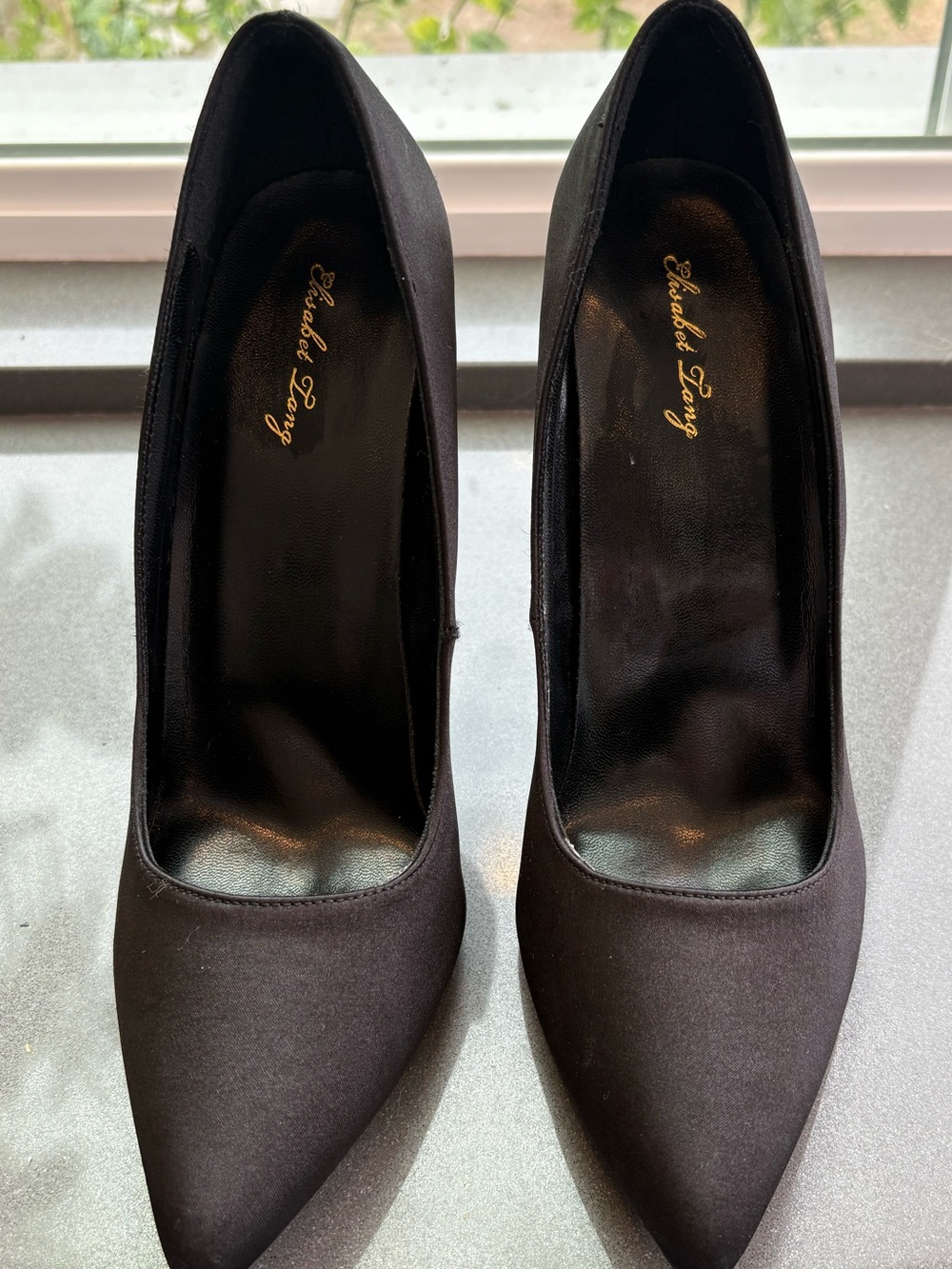 Elisabet Tang Satin Pointed-Toe Stiletto Pumps in black. Excellent condition